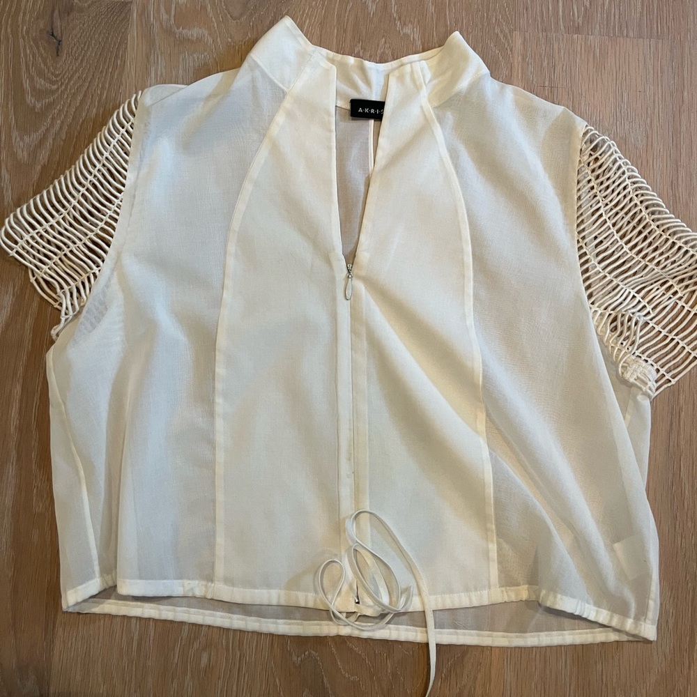 Akris top with zipper and tie and sleeve detail